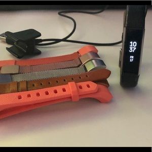 Fitbit Alta HR watch with extra straps